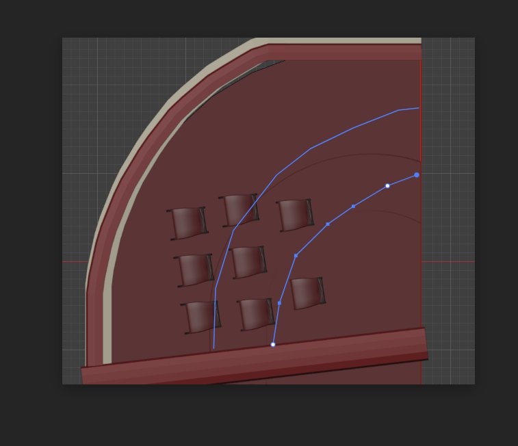 Close-up of a tier end with hand-drawn blue arcs